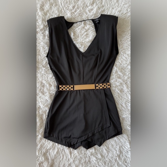 Chic Black and Gold Romper with Modern Silhouette - Picture 1 of 10